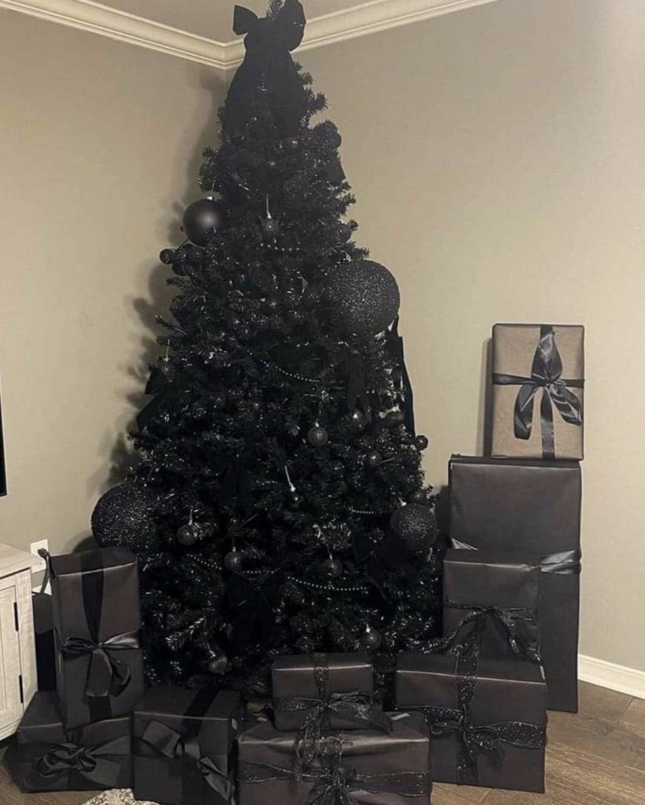 black christmas tree and presents